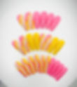 The Kiara set features a yellow, pink and frosted transparent base with wavy line accent nails