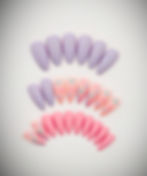 The Makayla set features soft lilac and pink base nails with heart design accent nails