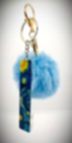 This convenient key chain is designed to assist with effortlessly pulling out your cards from your wallet