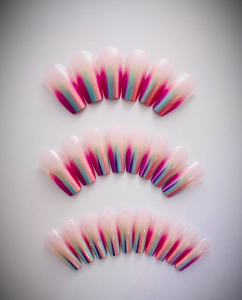 The Miley set has a soft beige base with a stunning rainbow ombre of pink, turquoise, orange, and purple