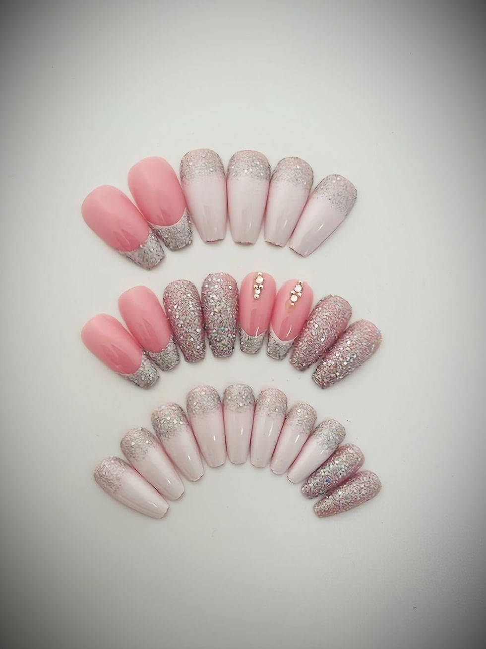 The Naomi set is a mix of soft pink nudes, white, silver glitter and rhinestones for extra sparkle