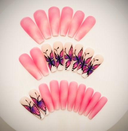 The Leila set features a beautiful matte hot pink airbrush design with butterfly accent nails
