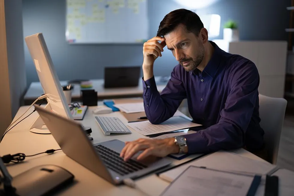 man-stressed-about-work.webp