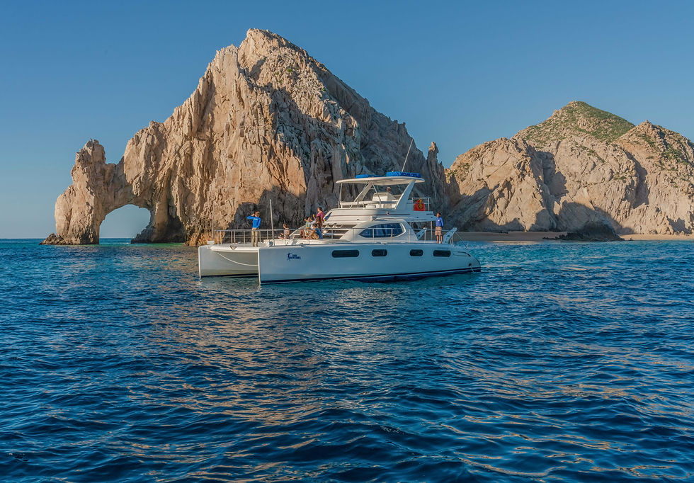 Catamaran anchored by El Arco of Cabo, Mexico