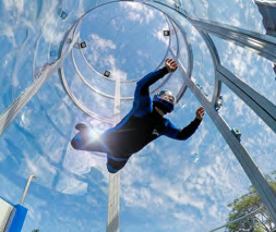 Person doing skydiving in the only wind tunnel in Baja California in Cabo San Lucas, Mexico.