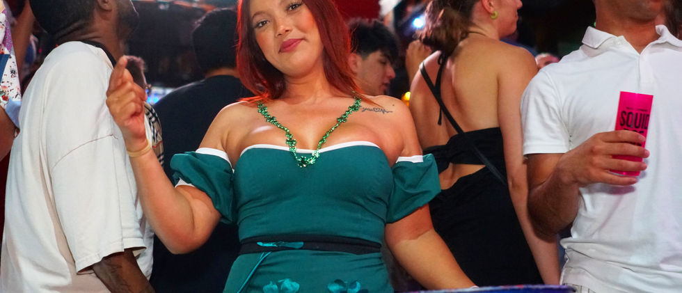 Woman in green dress at party