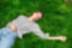Woman lying on grass


