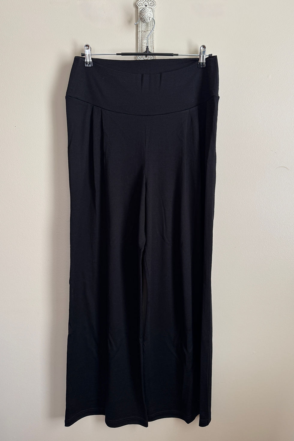 Thumbnail: Black merino wool Palazzo Pants in midweight jersey, product image on cream background showing full front view and wide-legs.