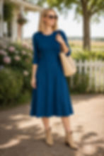 Woman wearing Atlantic Blue Colette merino wool 3/4 sleeve midi dress.