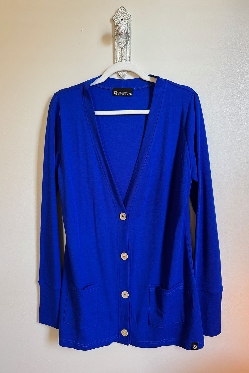 Thumbnail: Boyfriend Cardigan in royal blue mid-weight rib merino wool displayed on a hanger.