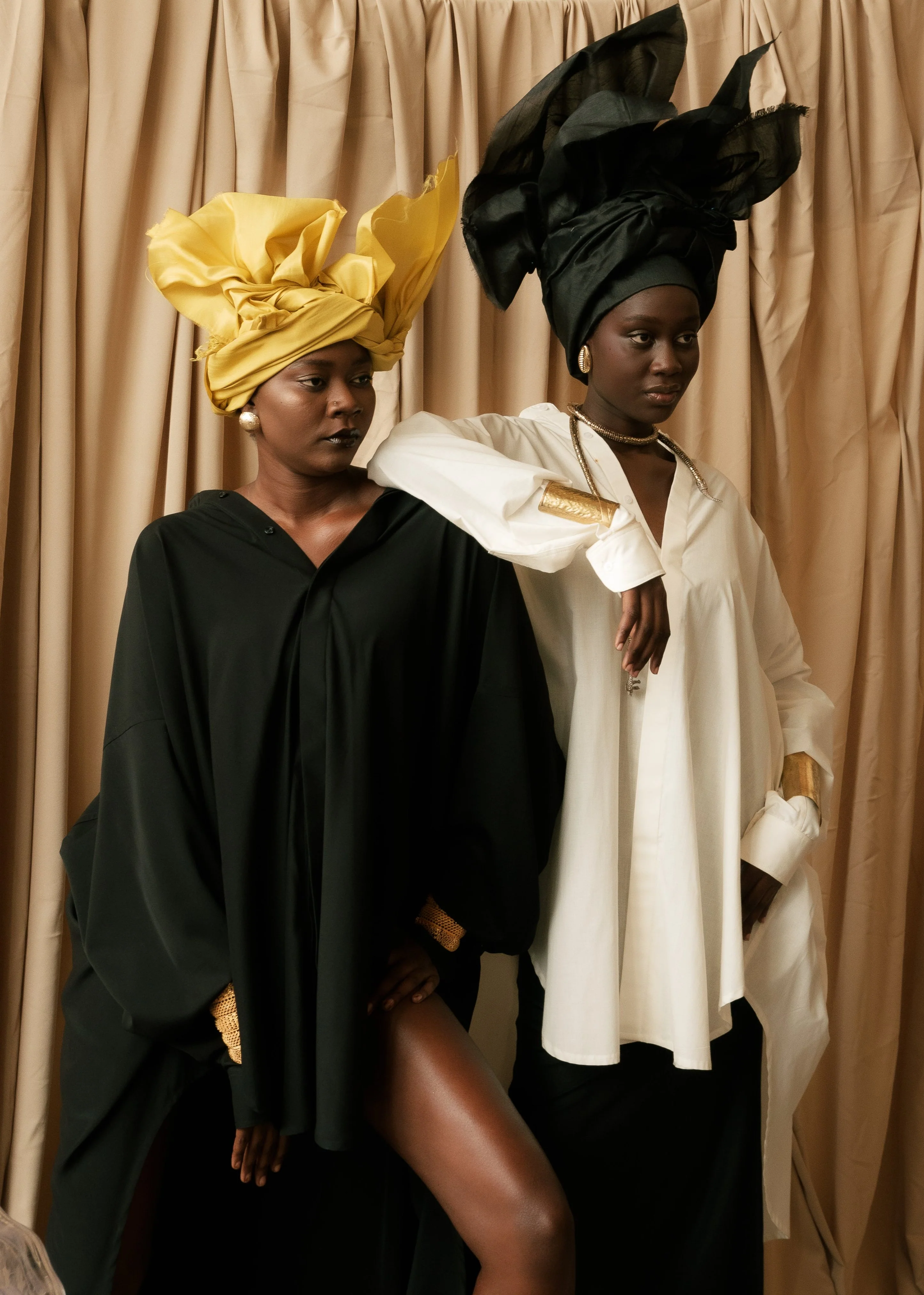 Effortless Movement” — A model strides in a light cotton dress down a stairwell, marrying elegance a