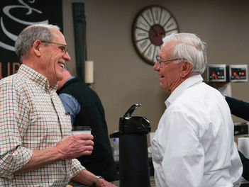 Two men chatting