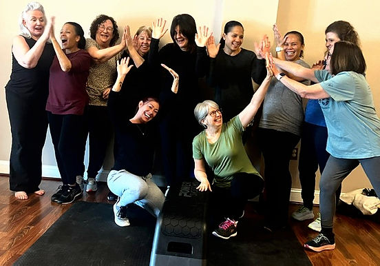 Joyful women's group celebrating success