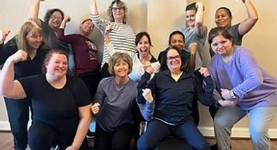 Empowered women's fitness class celebrating success