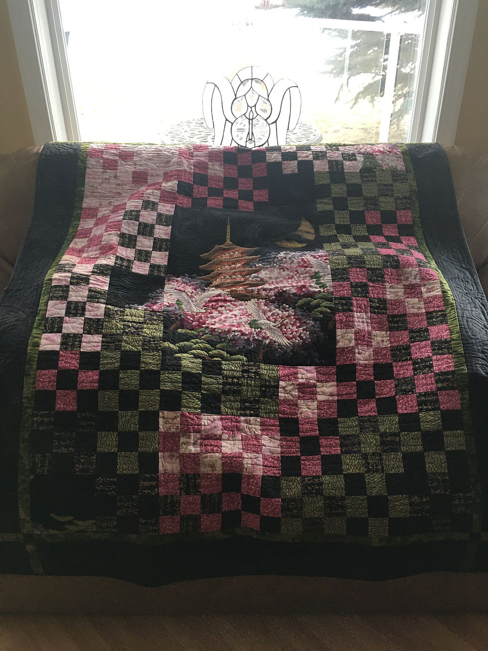 Custom longarm quilting and quality custom wallets and bags in Edmonton