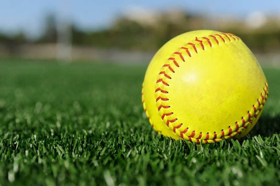 Softball-Laying-in-Grass-1024x681.jpg