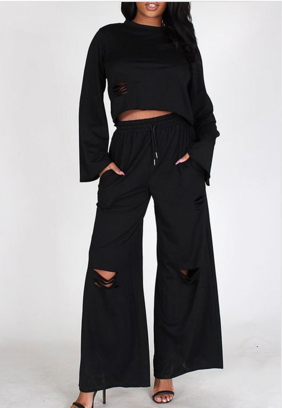 Thumbnail: Smaller woman showing pant set.