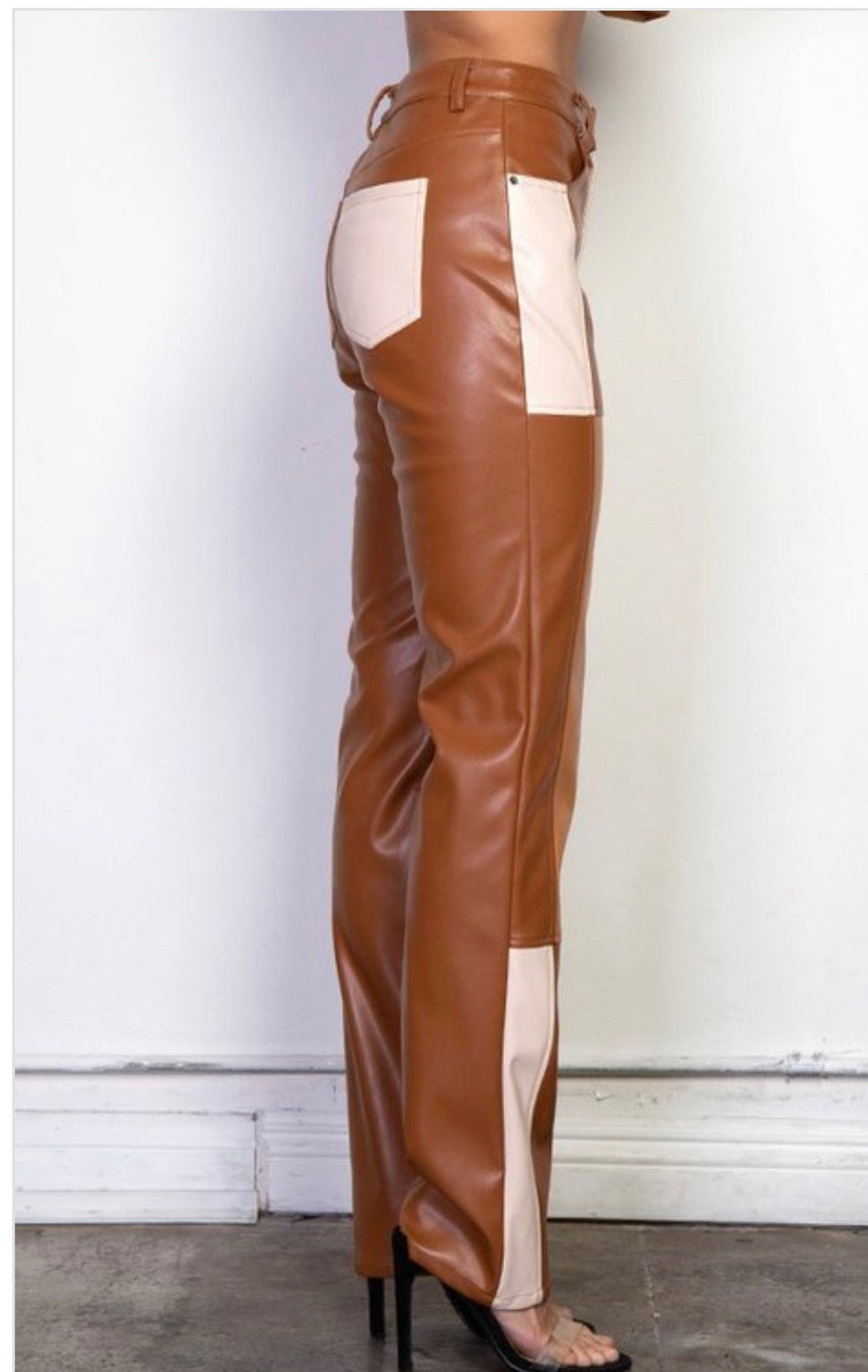 Thumbnail: Woman in color block pants, showing side view of pants.