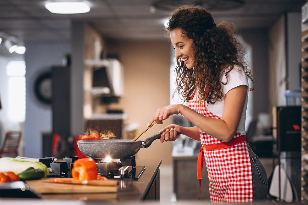 woman-chef-cooking-vegetables-pan_edited.jpg