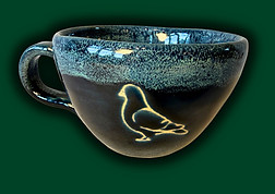 Hand made pottery pigeon cup