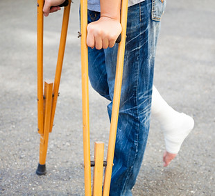 Person Using Crutches