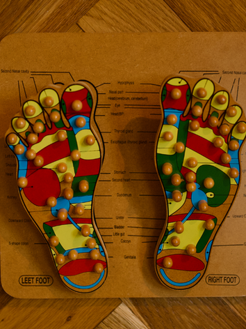 Reflexology Treatment and pressure points within the feet.