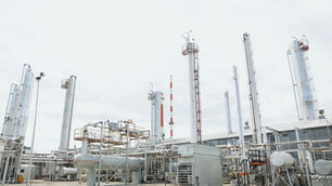 Industrial oil refinery and tanker terminal illustrating European energy security exposure across multiple supply vectors