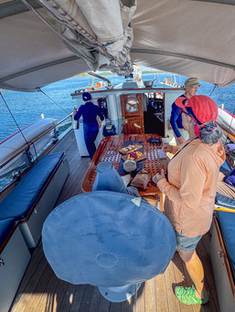 guests on the classic wooden schooner Passing Cloud