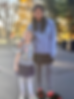 Older mentor student standing with younger student