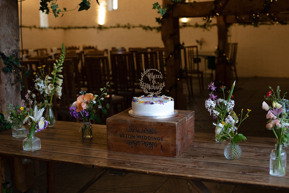 Eye-level view of a rustic wedding venue with floral decorations