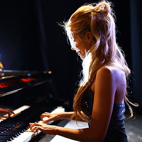 woman playing piano