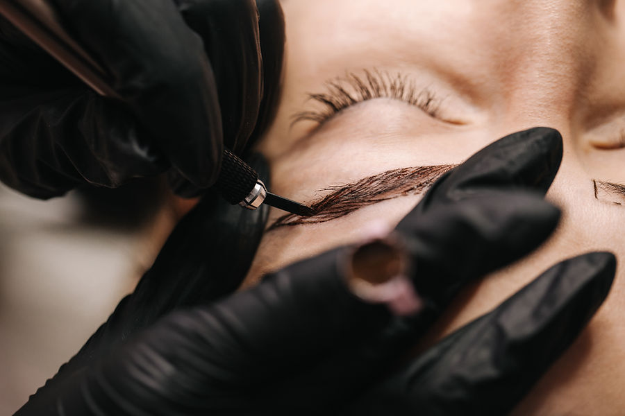 eyebrow microblading. A master in black