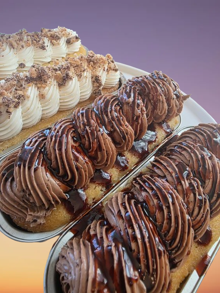 Thumbnail: Assorted eclairs with chocolate cream and nuts