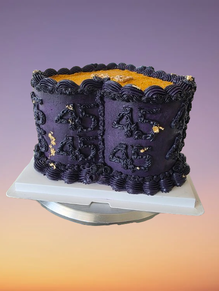 Thumbnail: Purple book cake with gold '45' details