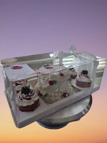 Thumbnail: Celebration cake and cupcakes in a clear gift box