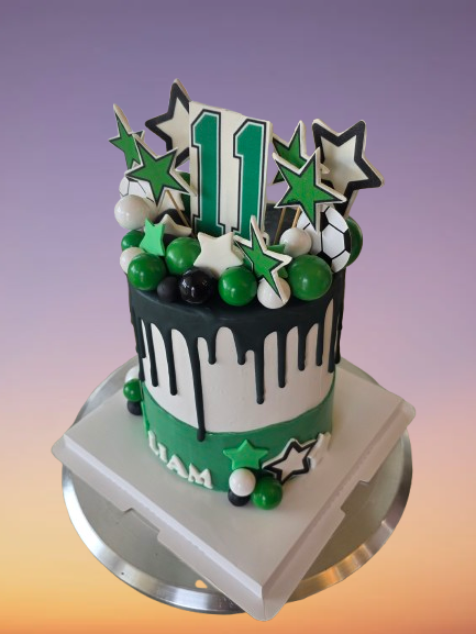 Thumbnail: Liam's 11th birthday cake, green, white, black with stars and soccer ball