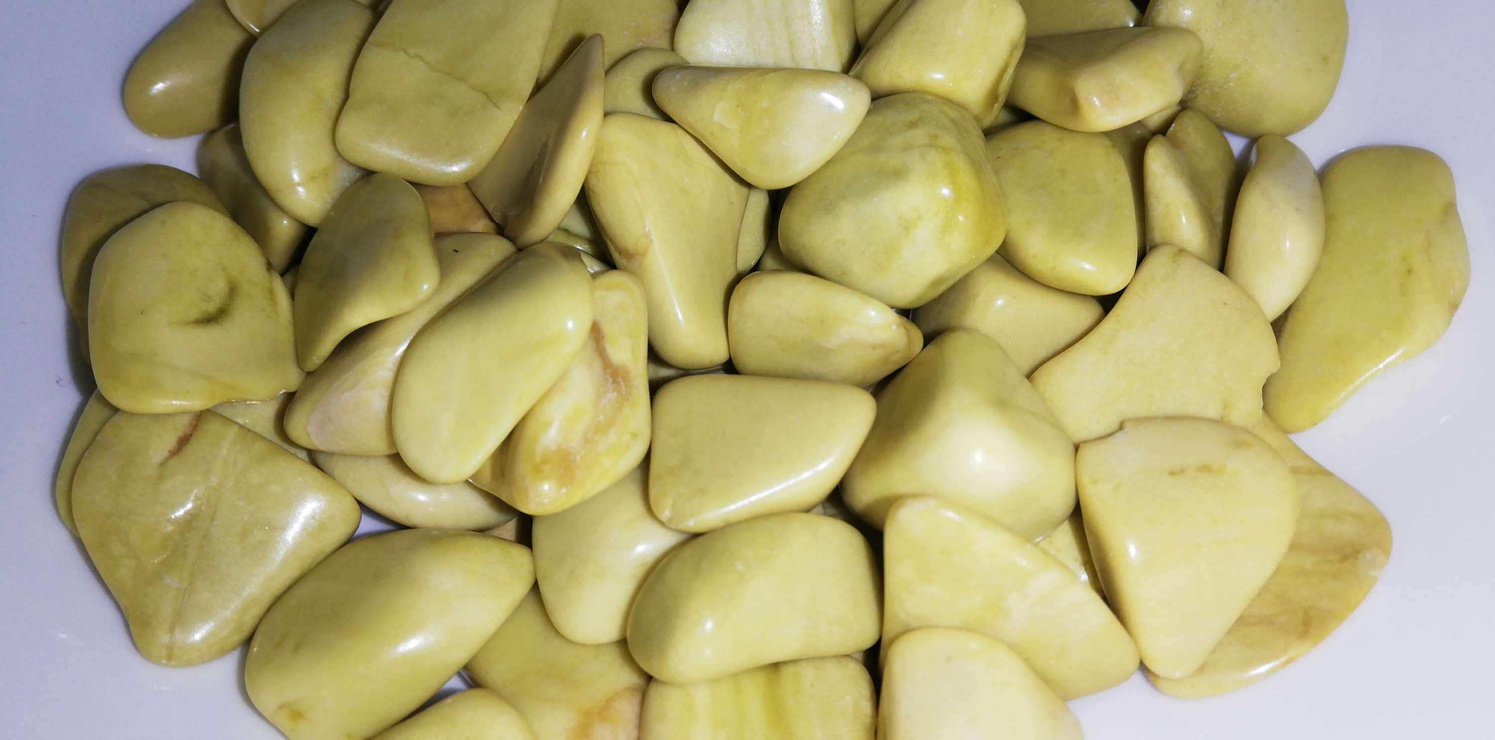 Serpentine, yellow tumblestones 