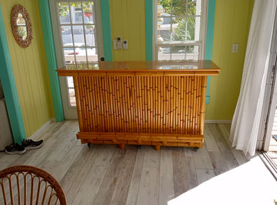 palapa bar with storage, wheels, and footrail
