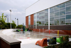 Gymnasium facade and water spray par