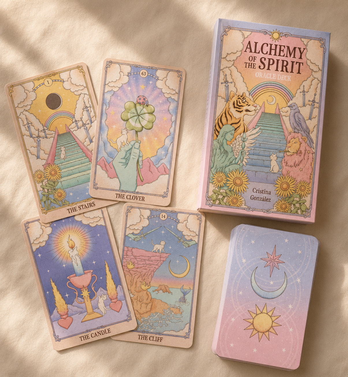 Alchemy of the Spirit oracle deck with pastel rainbow artwork and dreamy spiritual oracle cards displayed together.