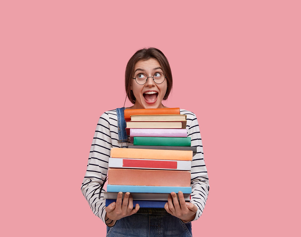 A woman holding books