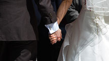 Groom and Bride holding Hands
