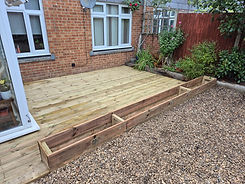Completed decking project in Bedford with built in planters