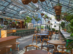 Construction Worker Lifting Wood Board