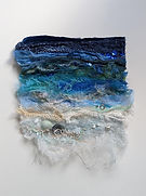 Textile artwork of abstract seascape