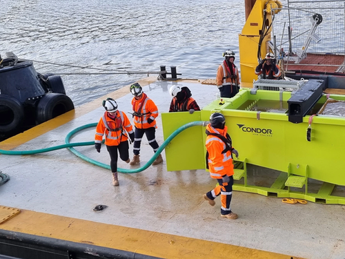 Condor's pH Correction Unit on the Sea View Wharf with Team Members working