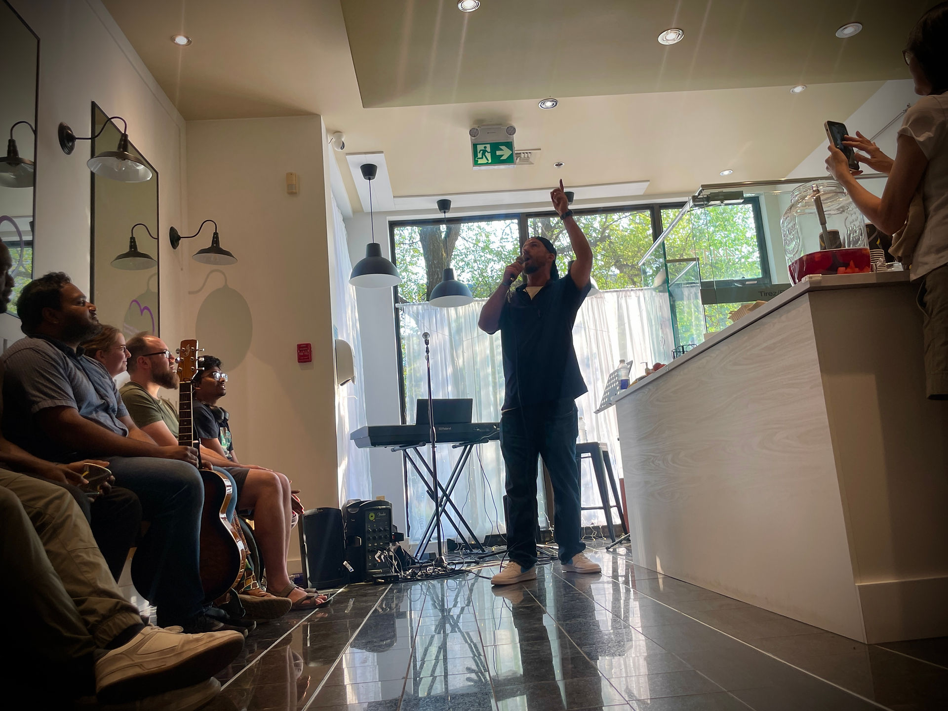 Spoken word moment with Robbie T, bringing energy, truth, and vulnerability to the room.