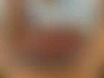 Tray of roasted geese cooking in a tipi fire during Cree community celebration in Fort George.