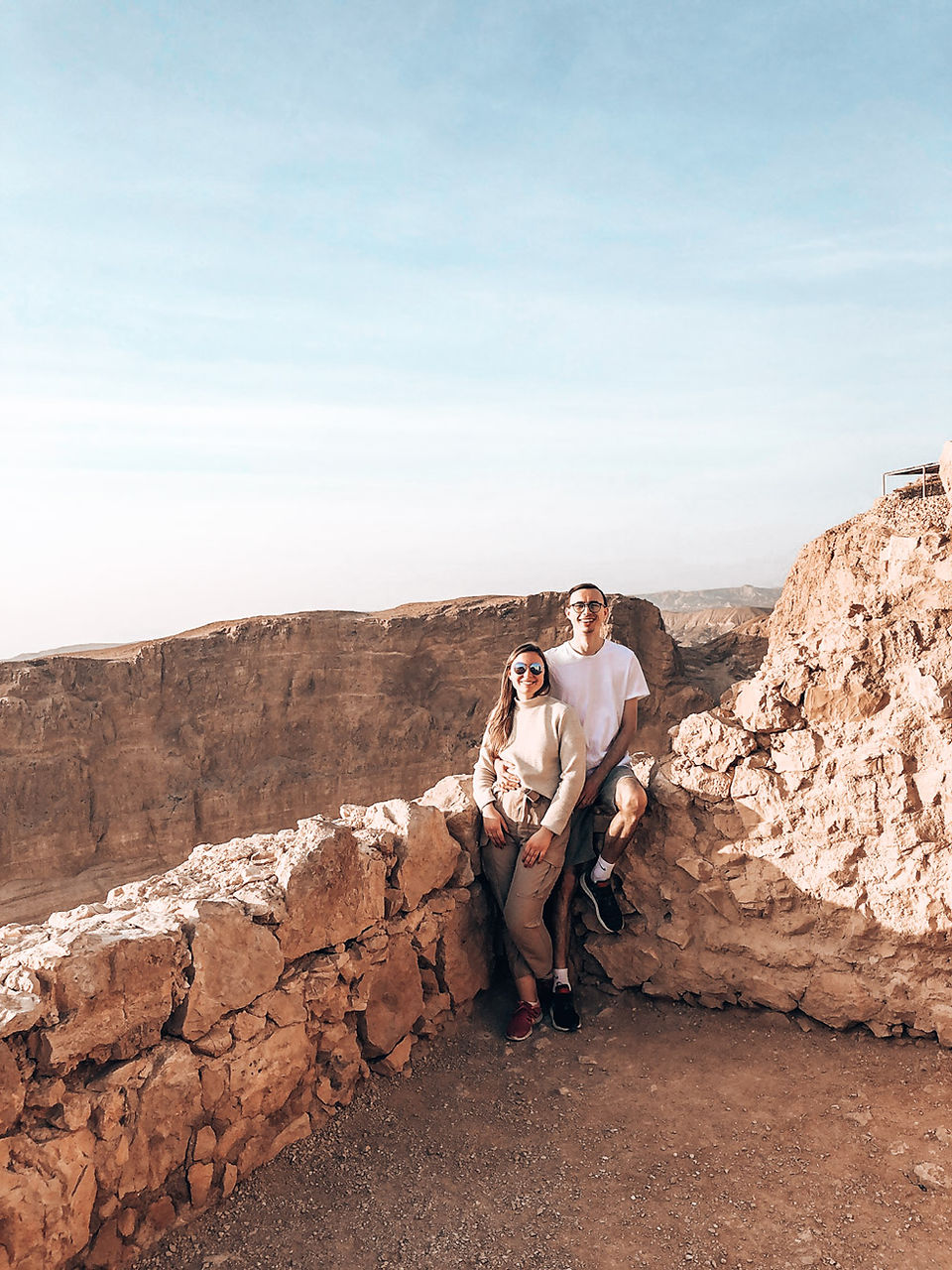 couple on top of masada fortress israel