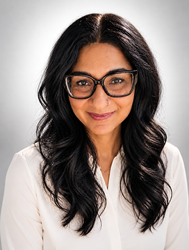 Warm Professional Portrait with Wavy Hair.png